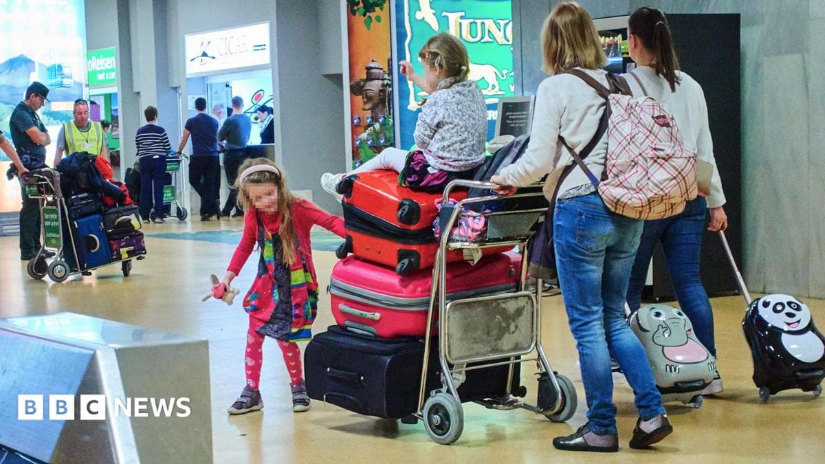 Ryanair says it will reluctantly not charge parents to sit next to children